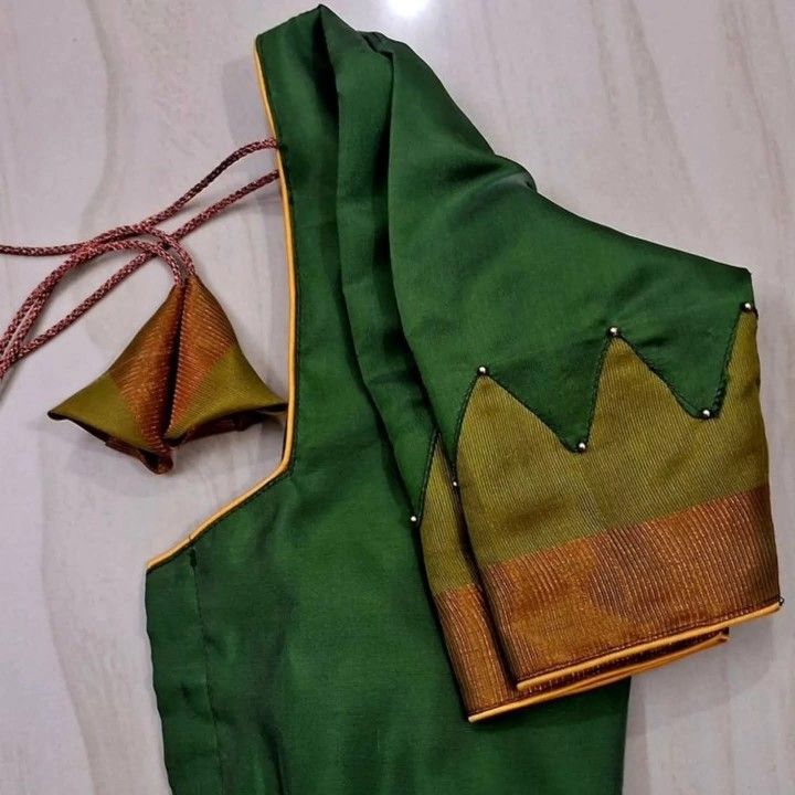 Forest green designer blouse sleeve with zigzag border, beads and gold piping